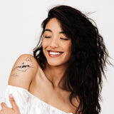 Astronaut & Narwhal Tattoo